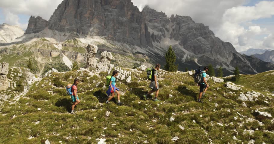 four people hiking